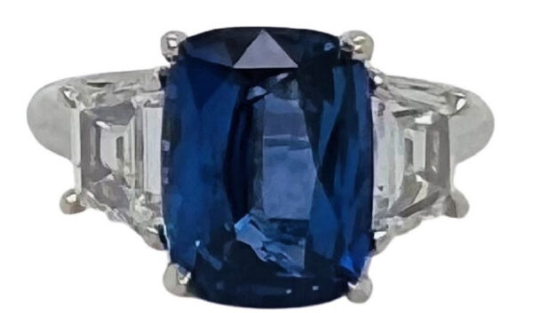 PLATINUM CUSHION SAPPHIRE AND TRAPS DIAMOND RING